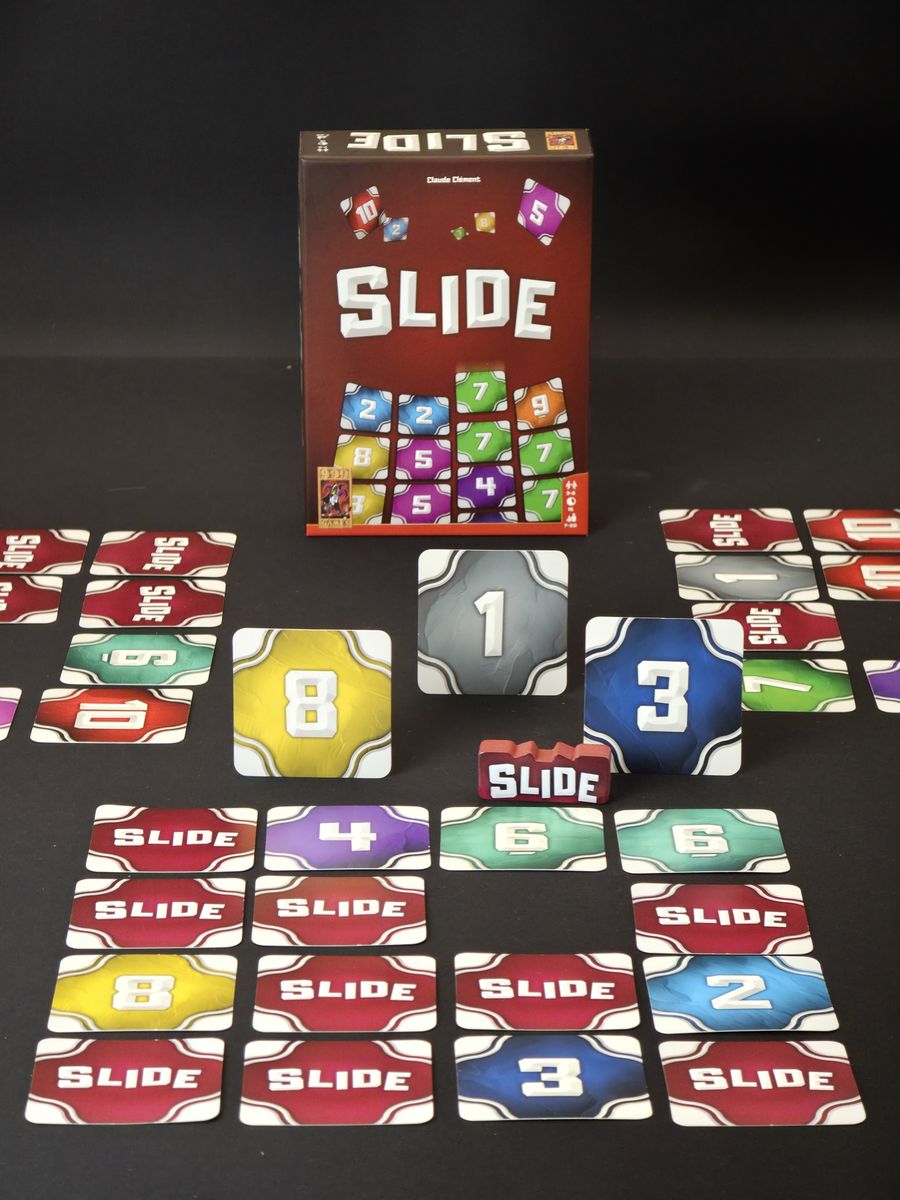 Several people playing Slide around a table