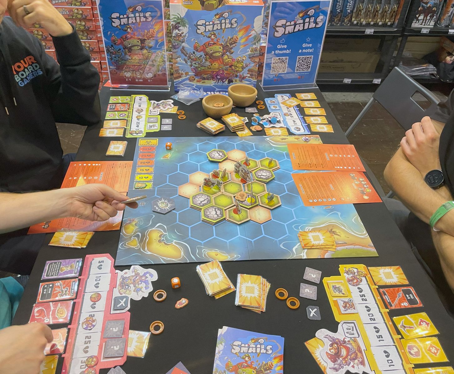 Snails board game in play at SPIEL 2024