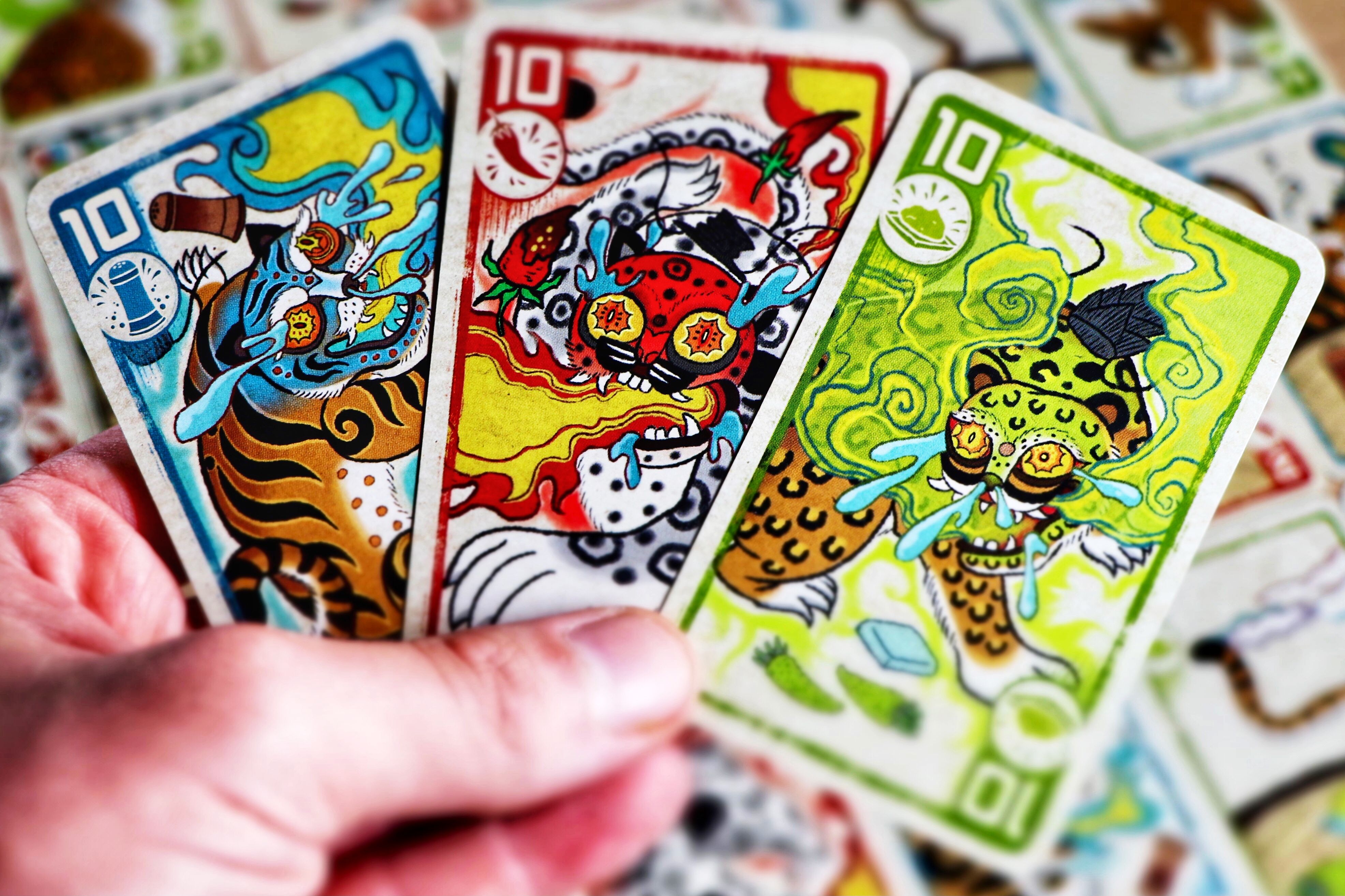 Spicy cards being played on a table