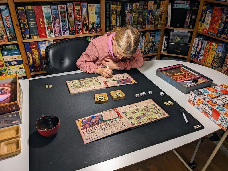 The Hobbit There and Back Again dry erase player book during play