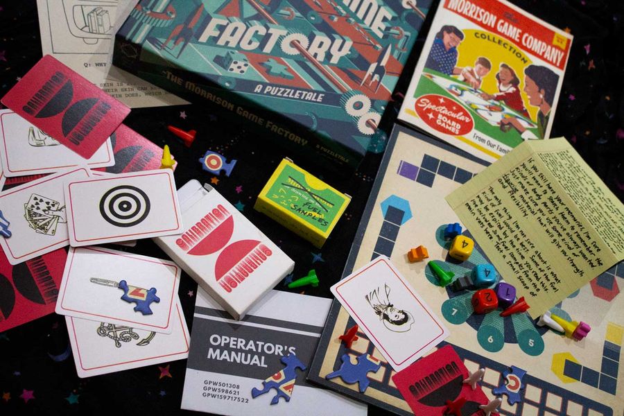 The Morrison Game Factory puzzle materials arranged on a table