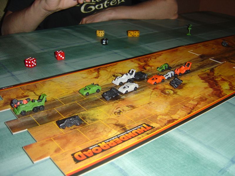 Thunder Road buggy and cars in a road battle