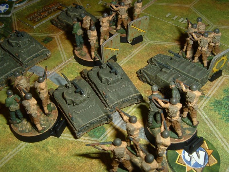 Painted Tide of Iron infantry and vehicle miniatures