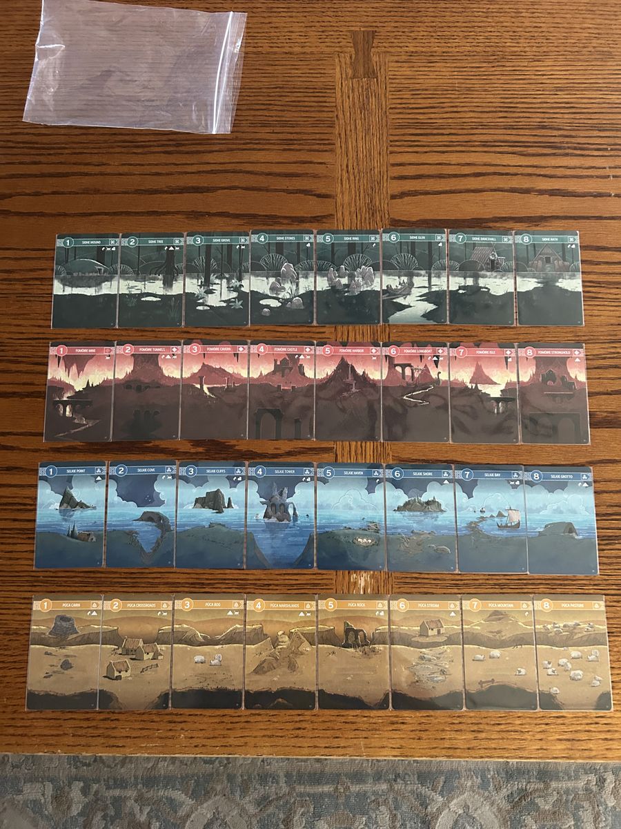 Tír na nÓg card sets forming panoramic landscapes
