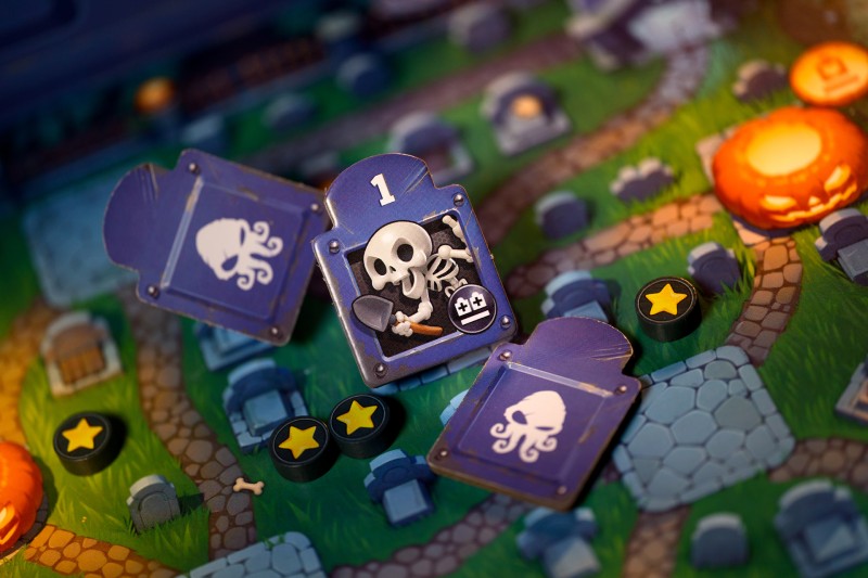 Toy Battle troop tiles on a terrain board