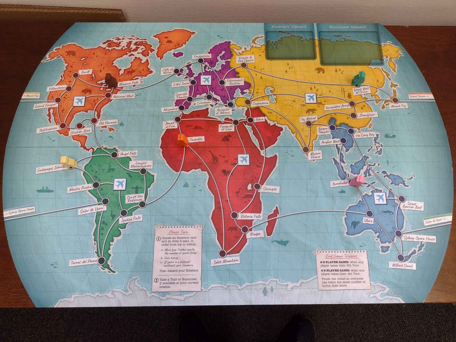 Trekking the World map board with trekker meeples