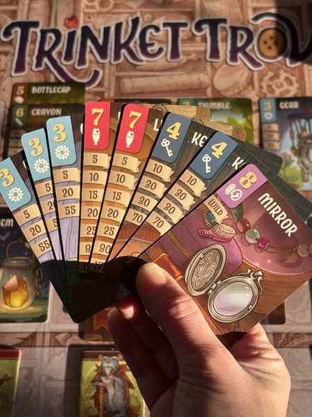 Trinket Trove cards arranged on a table