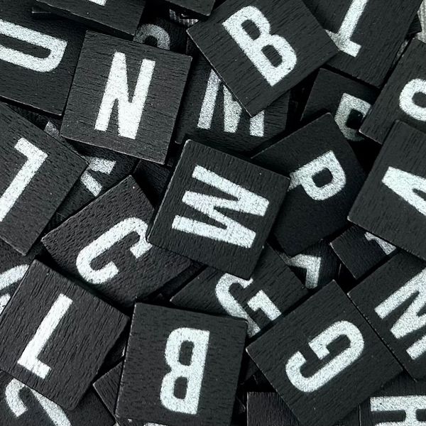 Typeset letter tiles and components
