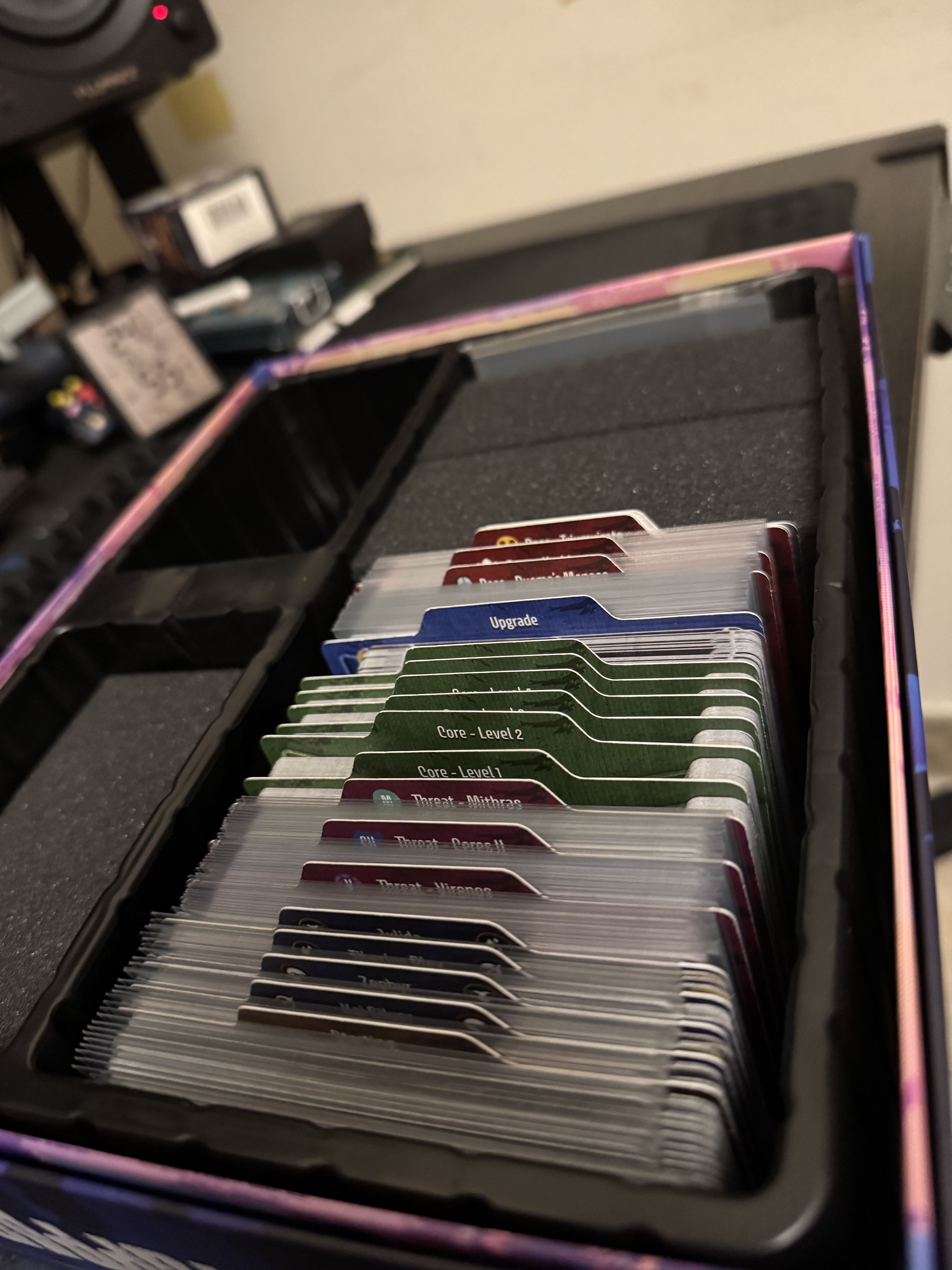 Unstoppable cards and dividers inside the game box