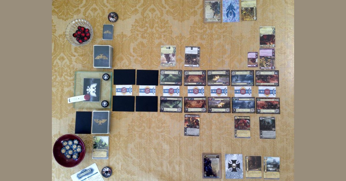 Warhammer 40000 Conquest planet cards and deployed units