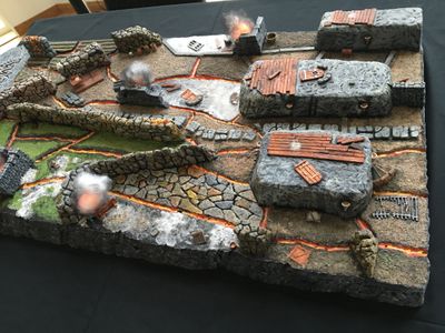 Wildlands miniatures on a ruined city game board
