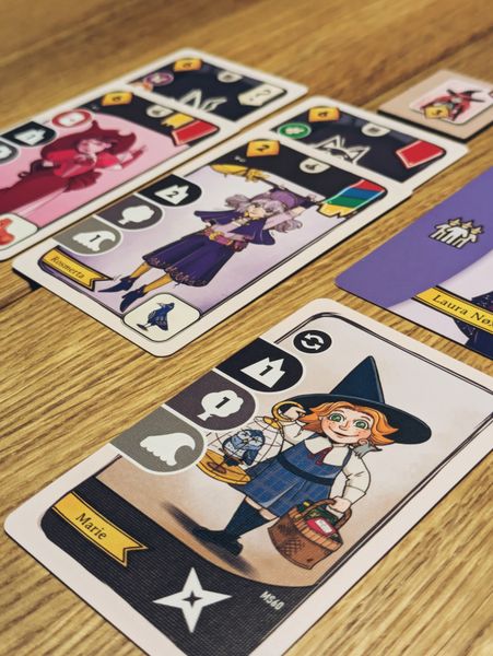 Witchdom card game in progress on the table