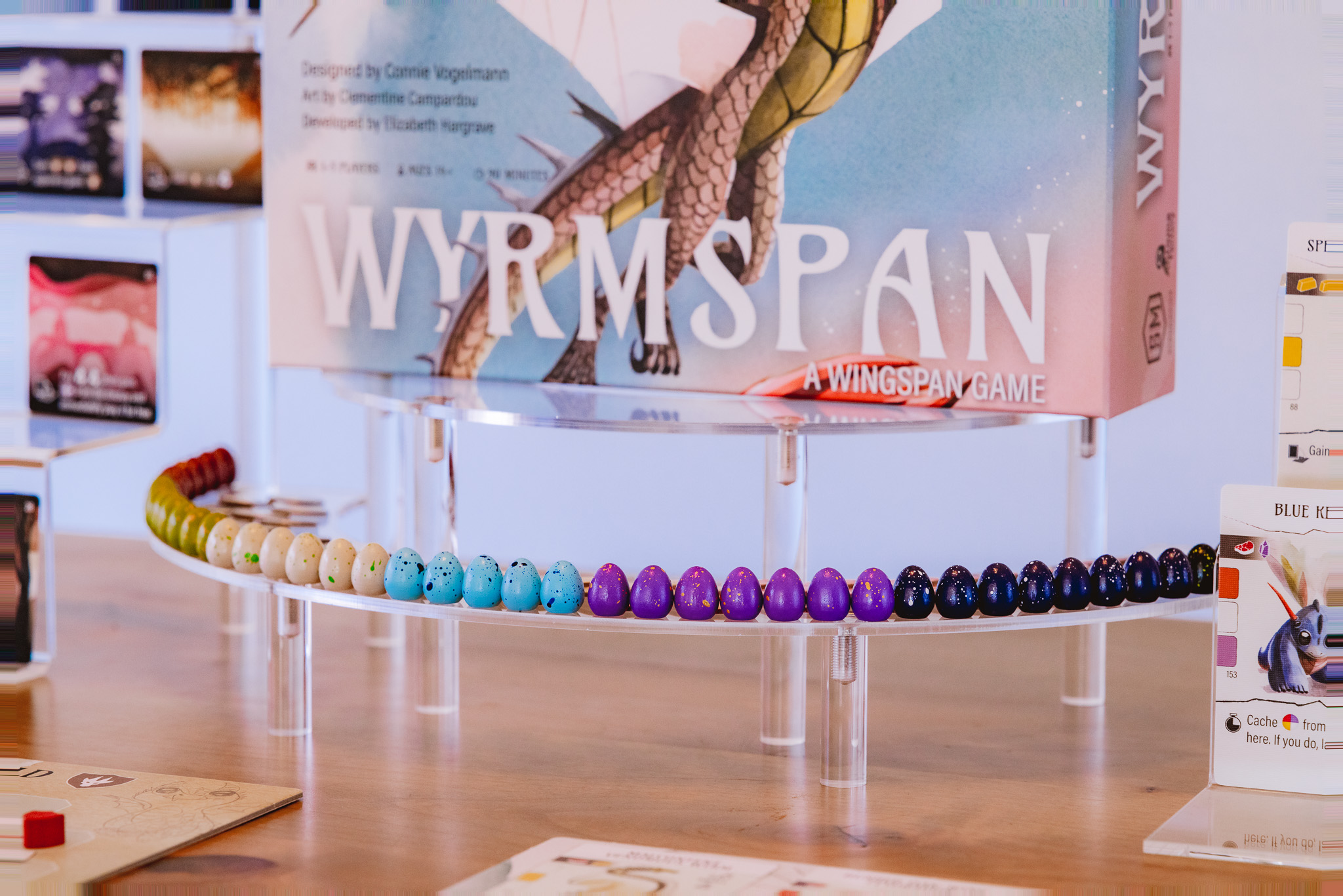 Wide table view of a Wyrmspan game