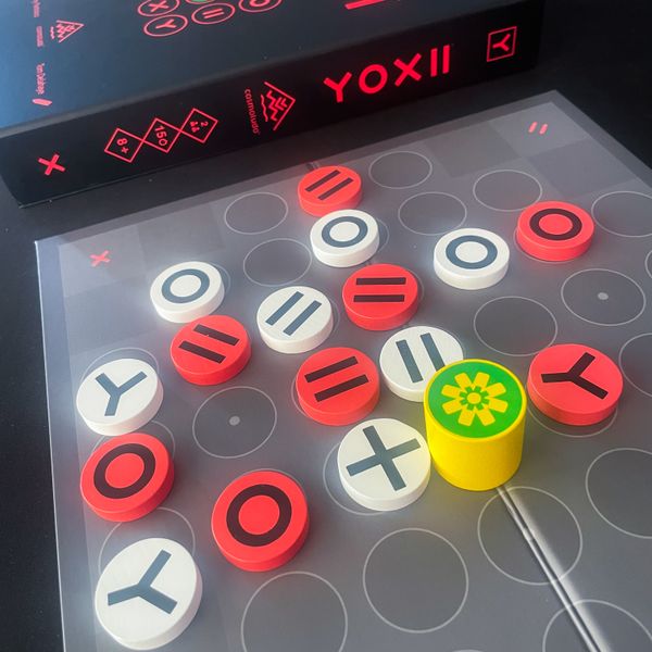 Yoxii Totem surrounded by numbered pieces