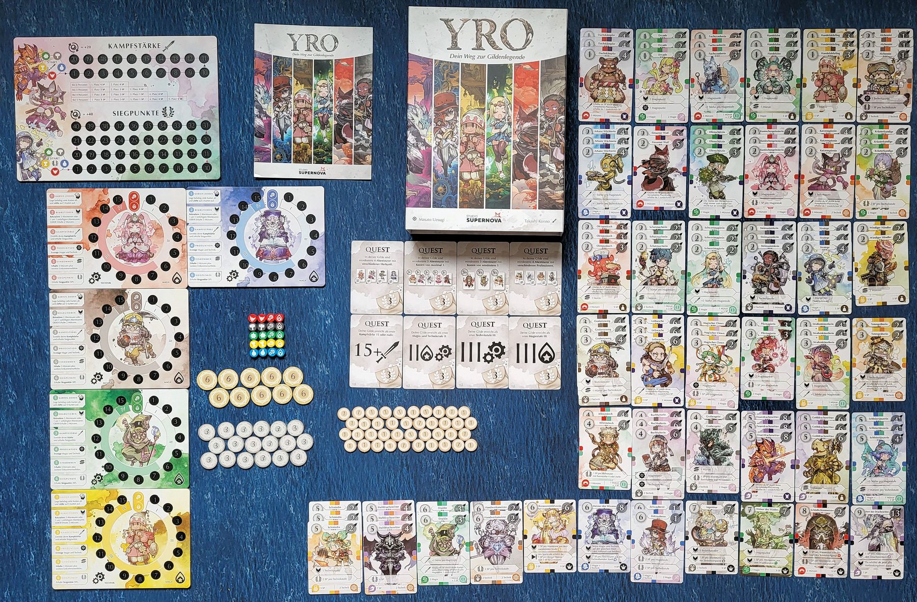 YRO board game components arranged beside the box