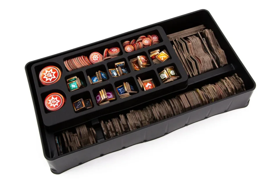 Gloomhaven organizer tray filled with tokens and map pieces