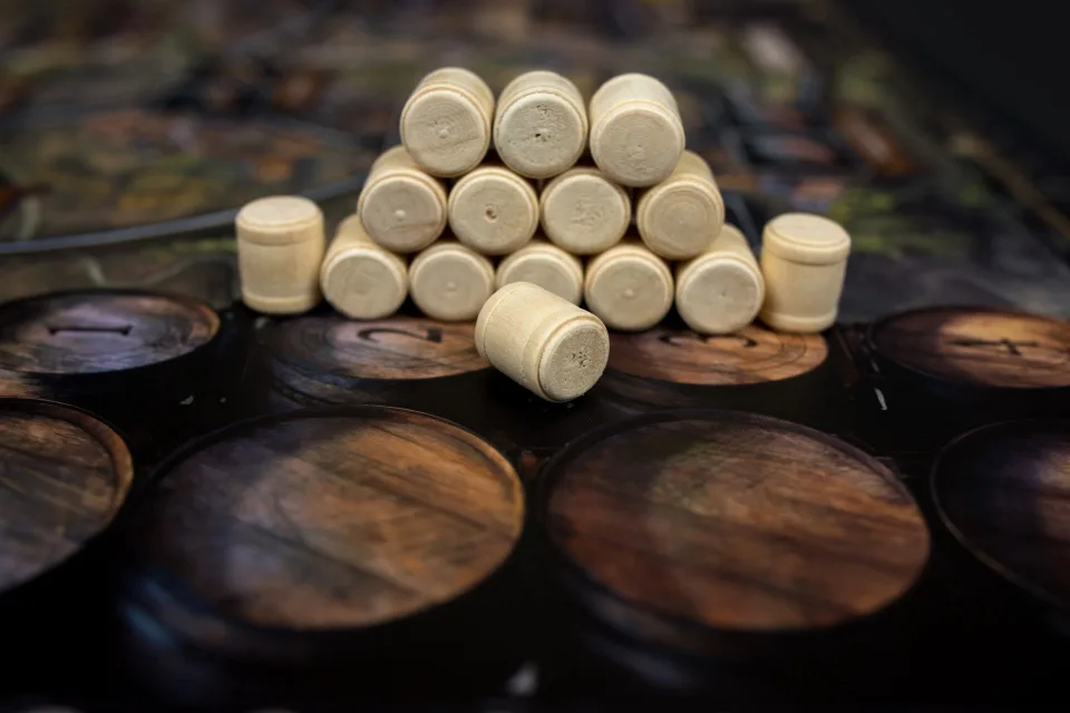 Wooden beer barrel pieces arranged on the Brass: Birmingham board