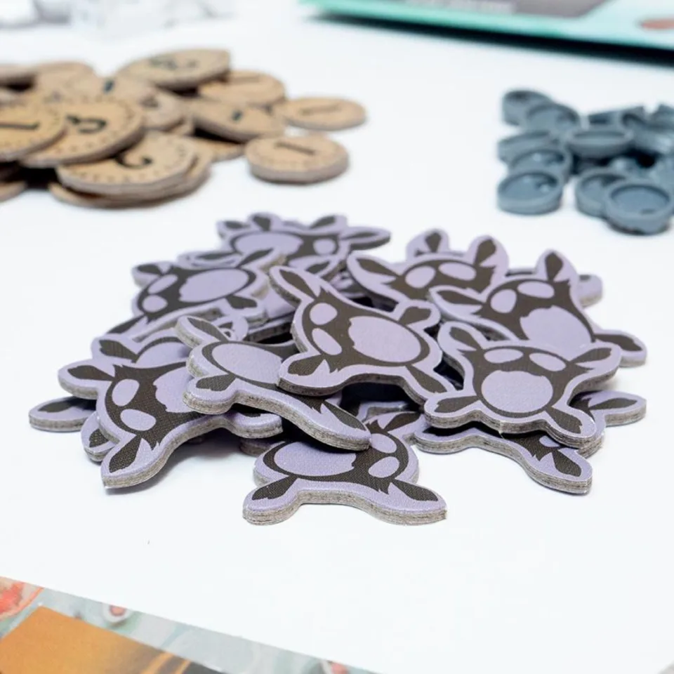 Close-up of Spirit Island cardboard invader tokens