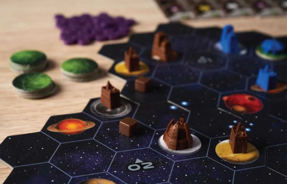 Gaia Project galaxy map in play with blue and brown faction buildings