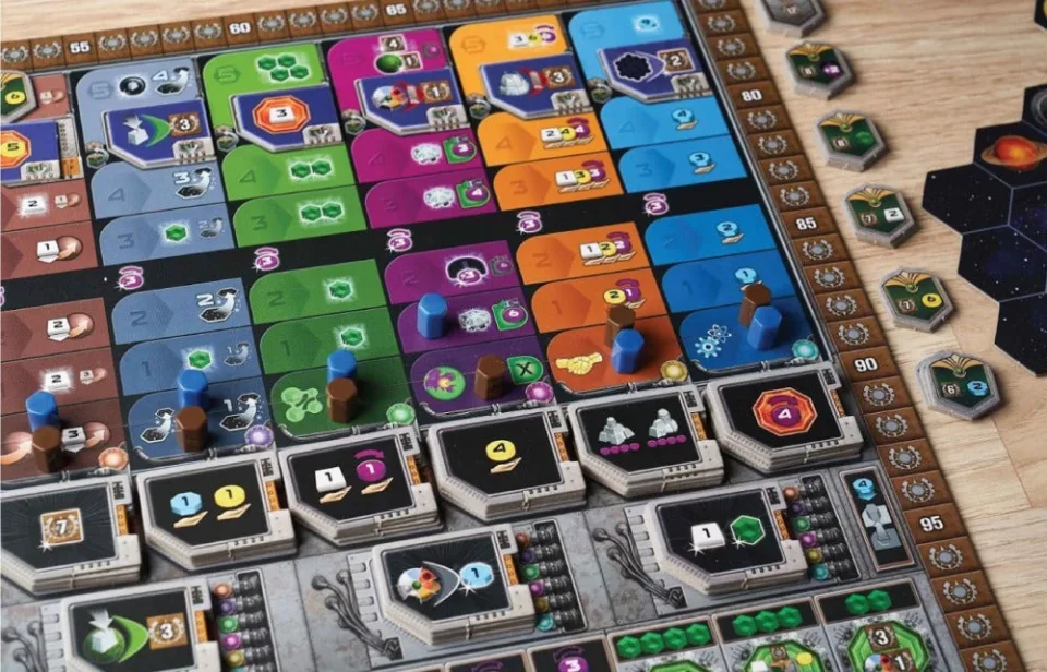 Gaia Project shared action board with colored action spaces and technology tiles