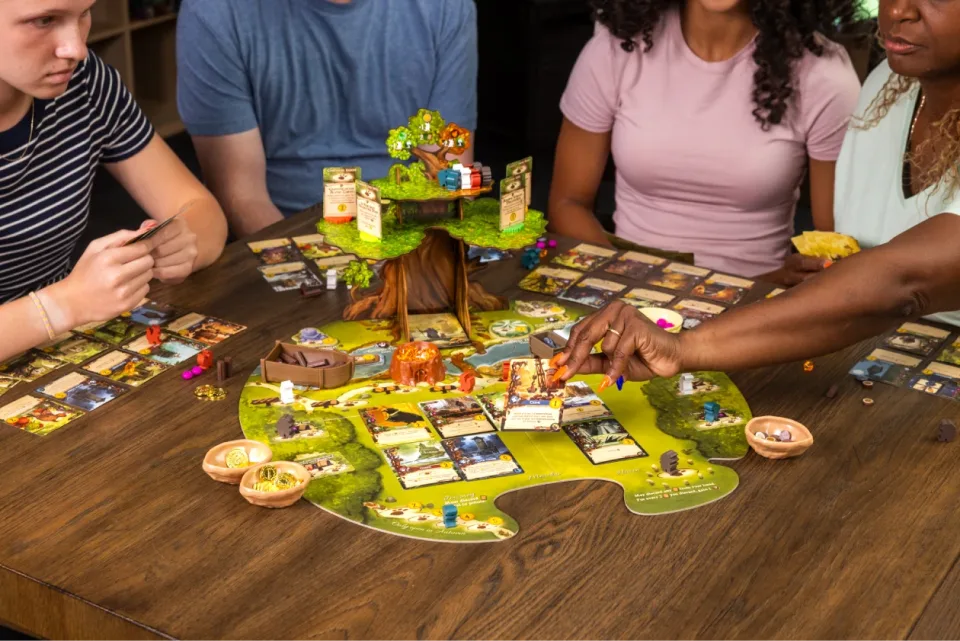 Close-up of Everdell game in play with cards, workers, and Ever Tree