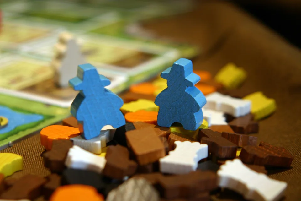 Developed Agricola farm board with wooden pieces.