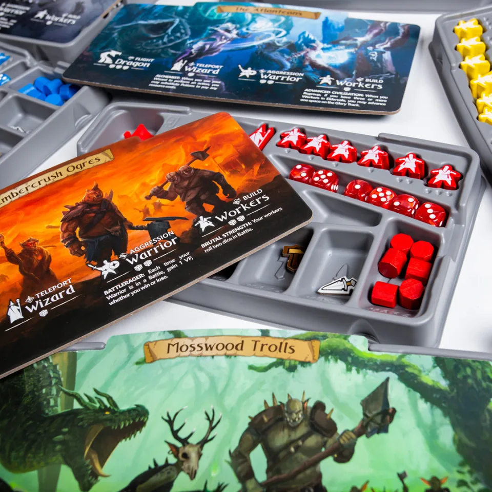 Dwellings of Eldervale faction cards, workers, dice, and pieces in an organizer tray.