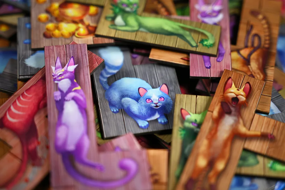 The Isle of Cats colorful cat tiles with different shapes and cat families.