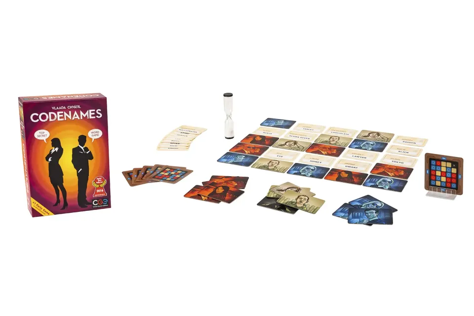 Players discussing clues during a game of Codenames.