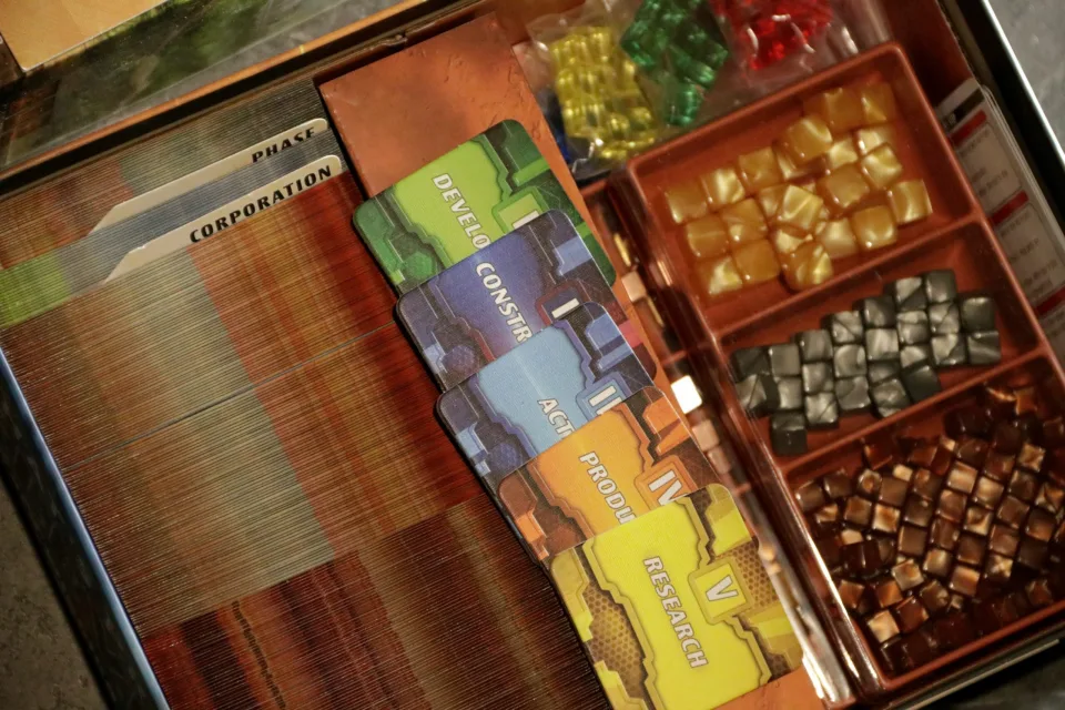 Close view of Terraforming Mars: Ares Expedition card play.