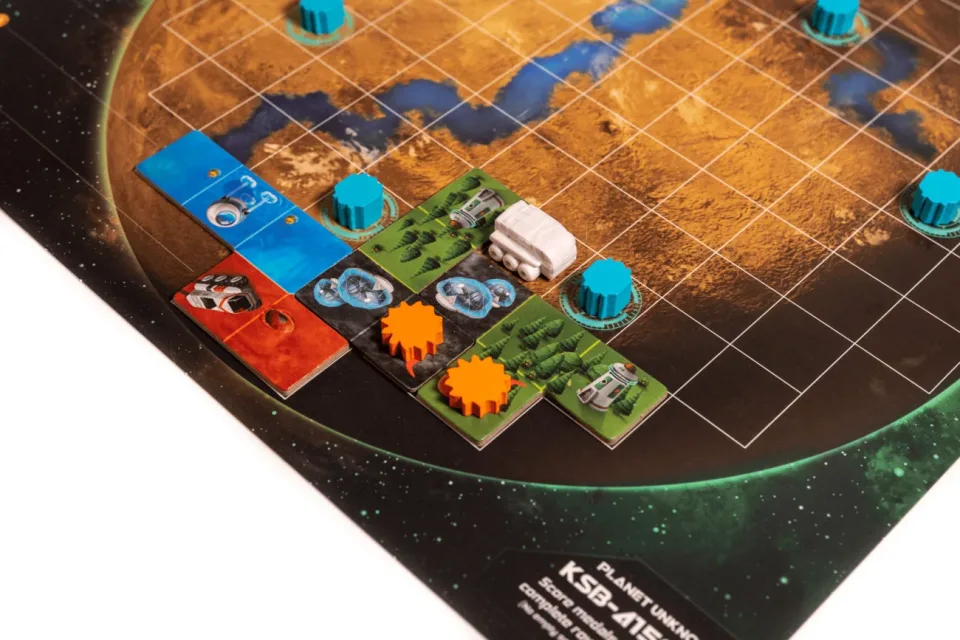 Close view of Planet Unknown tile placement and resource tracks.