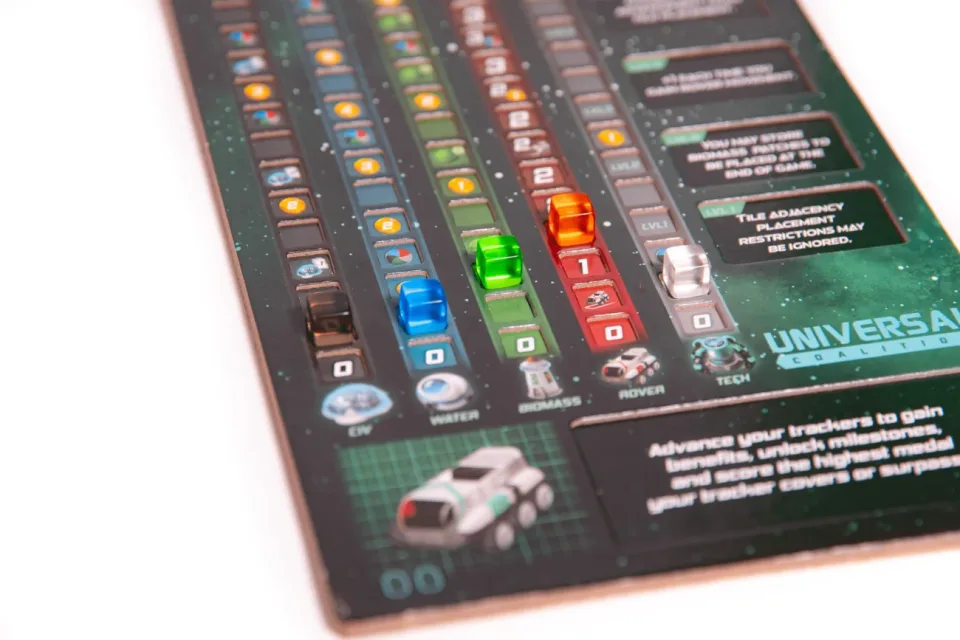 Planet Unknown planet boards, polyomino tiles, rovers, and markers.