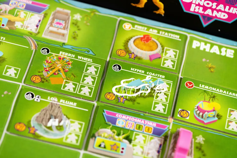 Close-up of Dinosaur Island park tiles and dinosaur attractions.