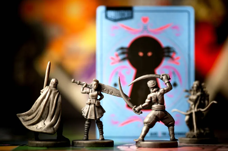 Unmatched Battle of Legends hero cards and player materials.