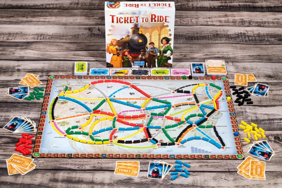 Ticket to Ride board set up with trains cards and player pieces
