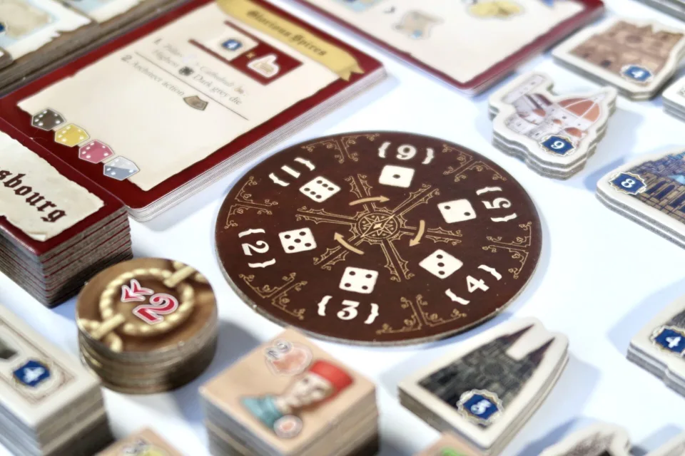 Tiletum die-selection wheel and action cards